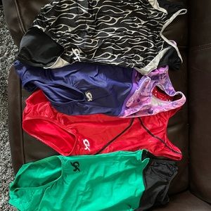 Lot of 8 Gymnastic leotards .Age 12/14/Adult XS